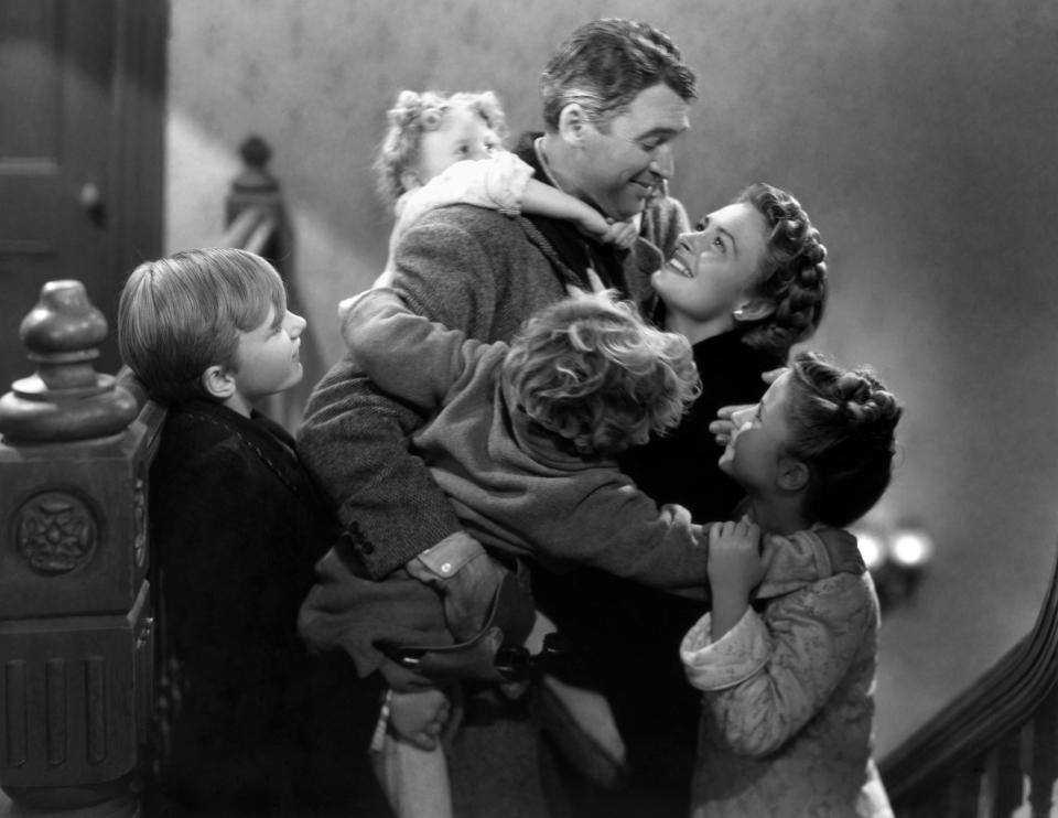 Clockwise from top: James Stewart, Donna Reed, Carol Coombs, Jimmy Hawkins, Larry Simms and Karolyn Grimes. (Photo by Herbert Dorfman/Corbis via Getty Images)