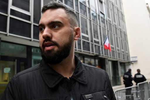 Eric Drouet, one of the leaders of the "yellow vest" movement, leaves police custody in Paris on Thursday