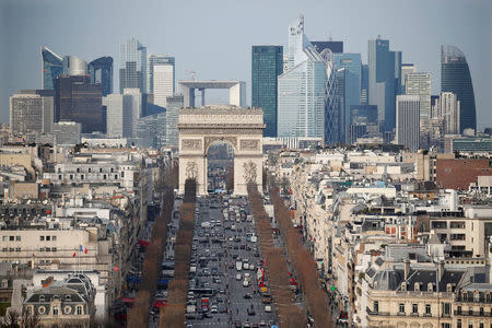 FILE PHOTO: General view of the skyline of La Defense business district behind Paris landmark the Arc de Triomphe and the Champs Elysees Avenue, France, January 13, 2016. REUTERS/Charles Platiau/File Photo