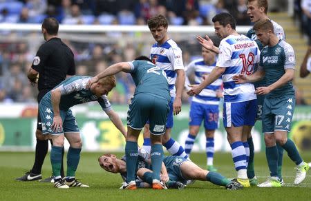 Britain Football Soccer - Reading v Wigan Athletic - Sky Bet Championship - The Madejski Stadium - 29/4/17 Wigan Athletic's Shaun MacDonald after a suspected broken leg Mandatory Credit: Action Images / Adam Holt Livepic