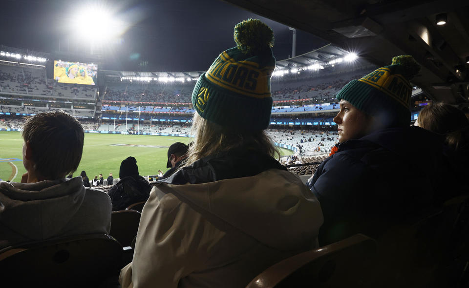 Spectators at the MCG, pictured here watching the Matildas on the big screen.