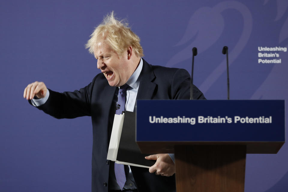 British Prime Minister Boris Johnson outlines his government's negotiating stance with the European Union after Brexit, during a key speech at the Old Naval College in Greenwich, London, Monday, Feb. 3, 2020. (AP Photo/Frank Augstein, Pool)