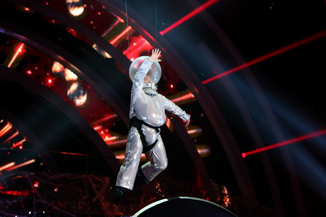 Embargoed to 0001 Saturday November 2. Strictly Come Dancing contestant Mark Benton flies through the air in a spaceman costume during a rehearsal for his Halloween dance routine at Elstree Studios in Borehamwood, Hertfordshire.  