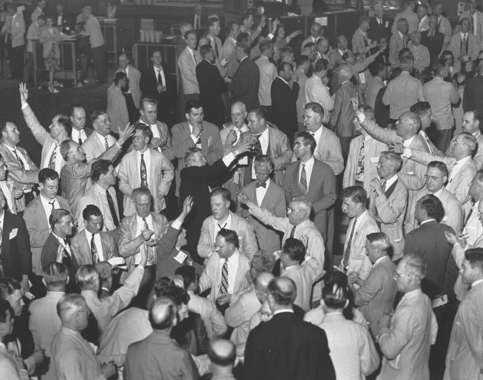 A group of traders work at the Chicago Board of Trade in Chicago, Illinois. (REUTERS/Chicago History Museum)