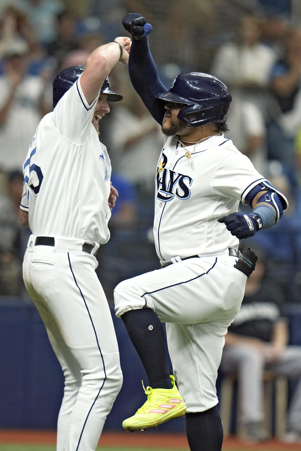 Tampa Bay Rays' Harold Ramirez, right, celebrates his two-run home run off Minnesota Twins starting pitcher Bailey Ober with Luke Raley during the fourth inning of a baseball game Thursday, June 8, 2023, in St. Petersburg, Fla. (AP Photo/Chris O'Meara)