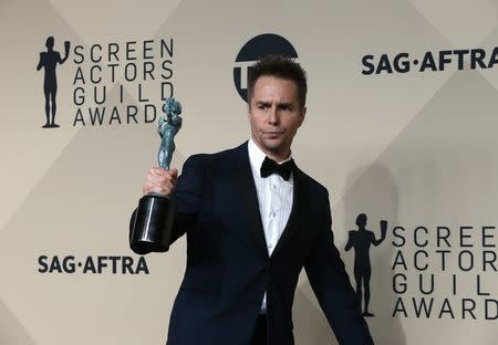24th Screen Actors Guild Awards – Photo Room – Los Angeles, California, U.S., 21/01/2018 – Sam Rockwell poses backstage with his award for Outstanding Performance by a Male Actor in a Supporting Role for "Three Billboards Outside Ebbing, Missouri". REUTERS/Monica Almeida