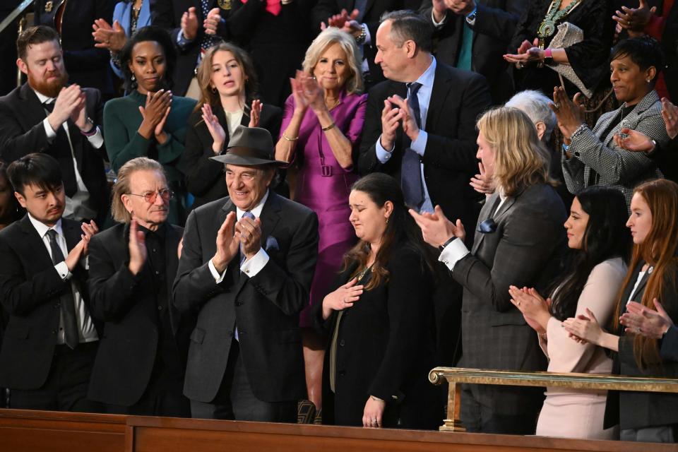 Mitzi Colin Lopez, second from right in the bottom row, attends President Joe Biden's State of the Union Address on Feb. 7, 2023.