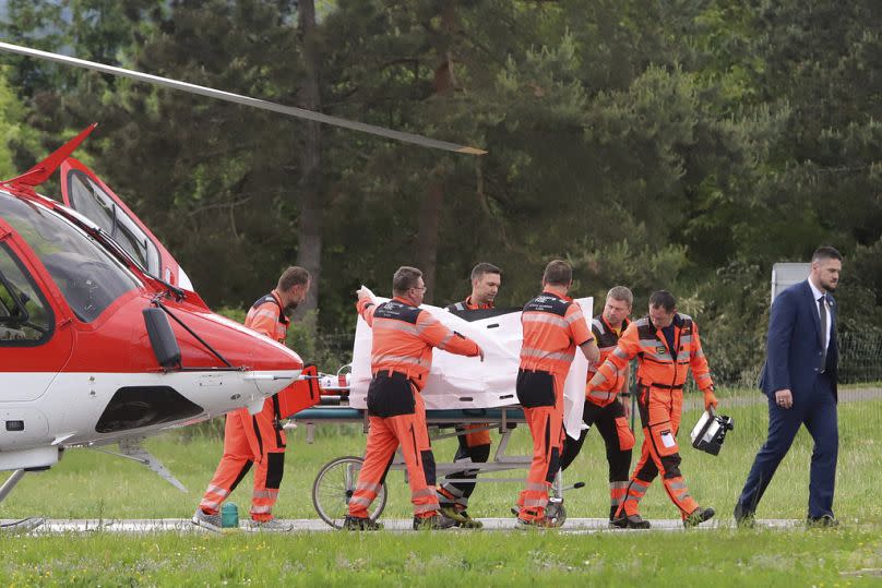 Rescue workers wheel Slovak Prime Minister Robert Fico, who was shot and injured, to a hospital in the town of Banska Bystrica, central Slovakia, Wednesday, May 15, 2024.