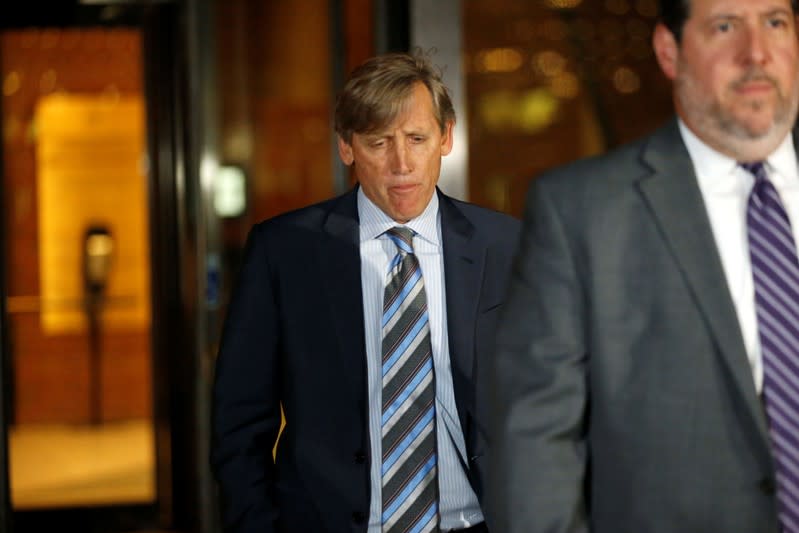 California businessman Jeffrey Bizzack leaves the federal courthouse in Boston