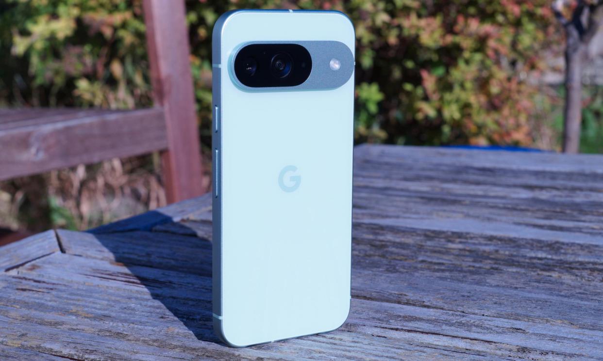 <span>The Pixel 9 is Google’s cheaper top-end phone, which keeps its standout design.</span><span>Photograph: Samuel Gibbs/The Guardian</span>