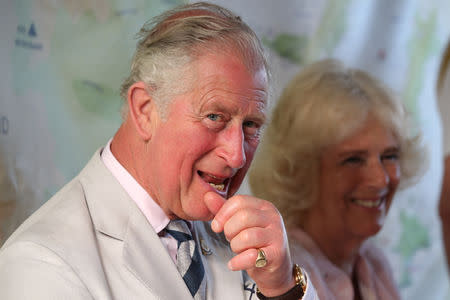 FILE PHOTO: Britain's Prince Charles and Camilla, Duchess of Cornwall, attend a reception at the Prime Minister's official residence, in Kingstown, St Vincent and Grenadines, March 20, 2019. Jane Barlow/Pool via REUTERS