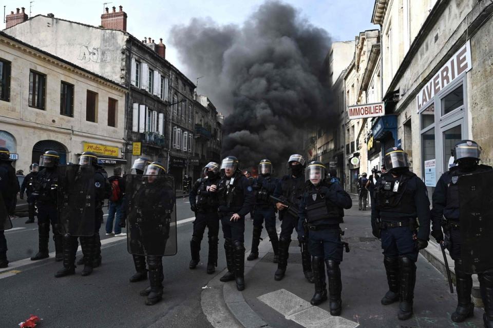 French Republican Security Corps officers faced  down retirement protesters on Friday (AFP/Getty)