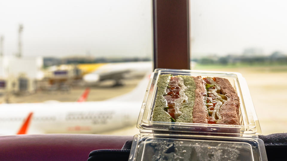 sandwich in a plastic container at the airport