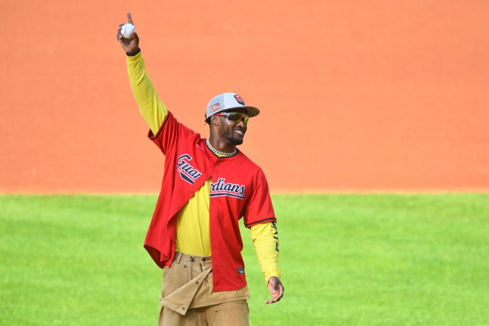 May 21, 2024; Cleveland, Ohio, USA; Cleveland Browns cornerback Denzel Ward stands on the mound during a ceremonial first pitch before a game between the Cleveland Guardians and the New York Mets at Progressive Field. Mandatory Credit: David Richard-USA TODAY Sports