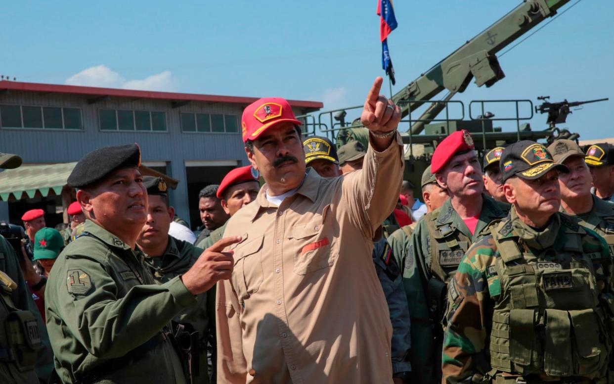 Mr Maduro has made a show of military control since the power struggle began - AFP