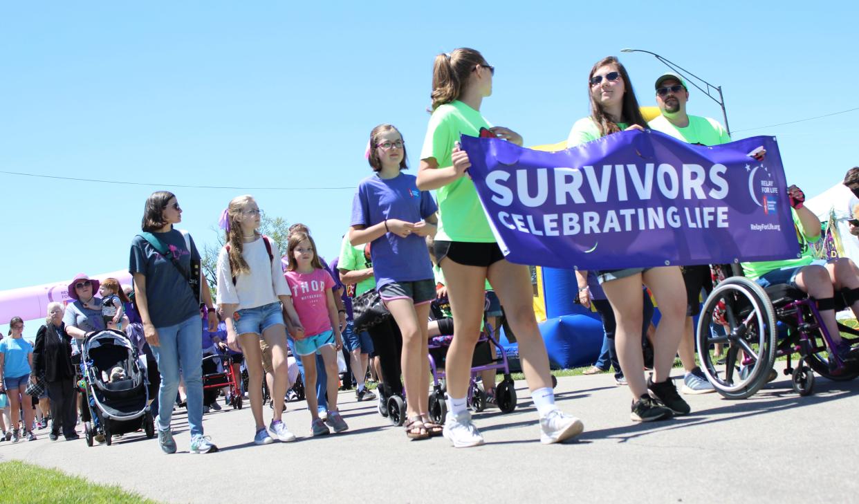 In its 29th year, Relay for Life for Monroe County took place at the Monroe County Fairgrounds, 3775 S. Custer Rd. Cancer survivor Elly Wickenheiser of Carleton and her family carried a purple banner that read, “Survivors Celebrating Life.”