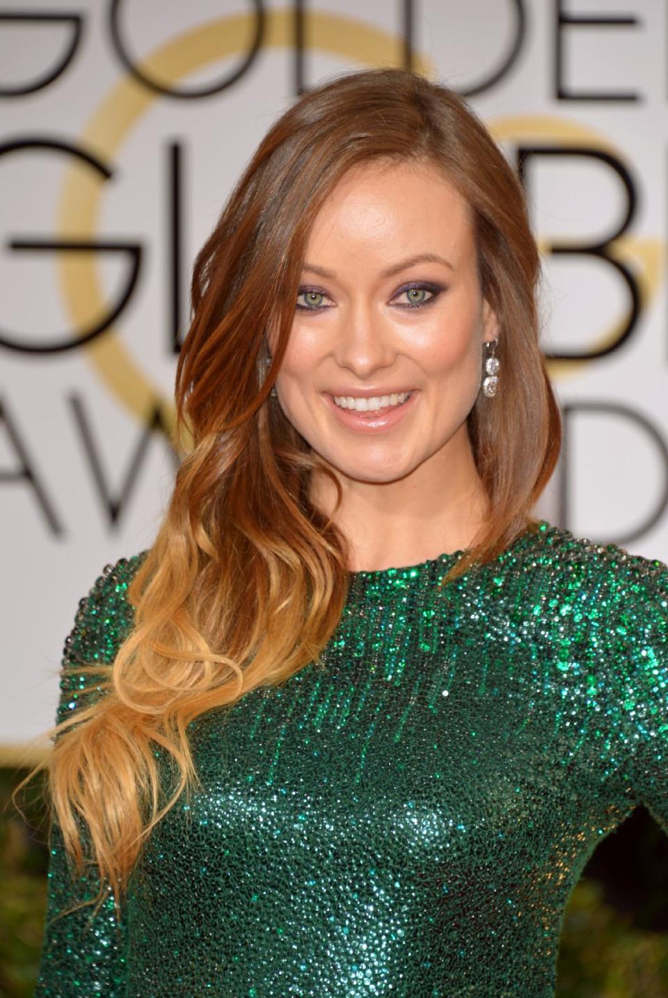Olivia Wilde arrives at the 71st annual Golden Globe Awards at the Beverly Hilton Hotel on Sunday, Jan. 12, 2014, in Beverly Hills, Calif. (Photo by John Shearer/Invision/AP)