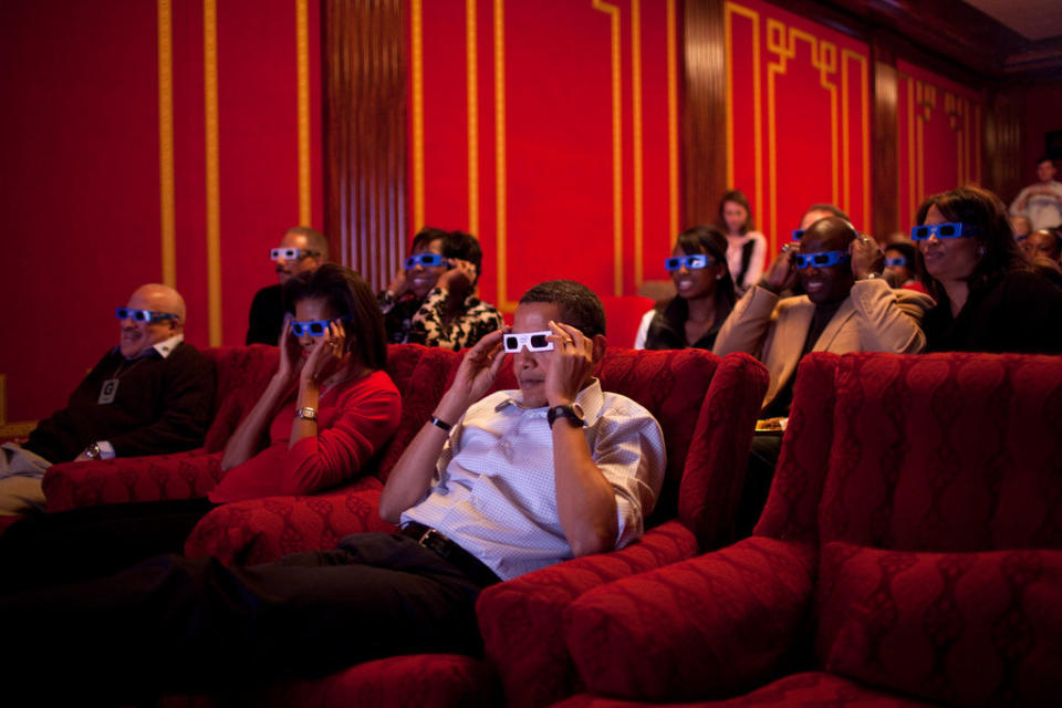 Obama and the first lady&nbsp;wear 3D glasses while watching a TV commercial during Super Bowl XLIII, Arizona Cardinals vs. Pittsburgh Steelers, in the family theater of the White House on Feb. 1, 2009. Guests included family, friends, Cabinet members, staff members and bipartisan members of Congress.