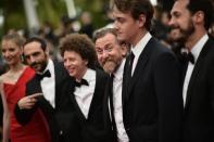 Mexican director Michel Franco (C) and British actor Tim Roth (3rR) arriving for the Cannes closing ceremony