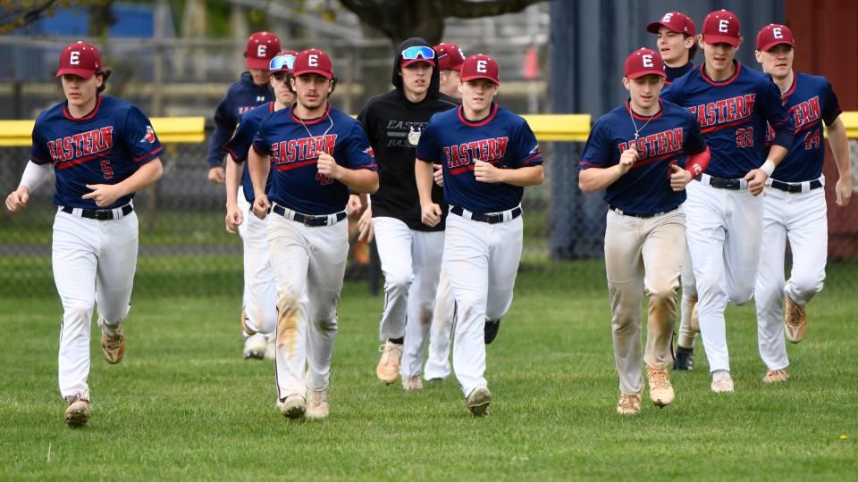 Members of the Eastern High School baseball team warm up prior to the Camden County Tournament semifinal round game between Eastern and Gloucester played at Gloucester High School on Wednesday, April 17, 2024.