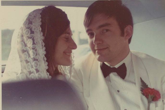 Joan and John Fisher on their wedding day. The two met during orientation week at Memorial University, and were together since they were 17. 