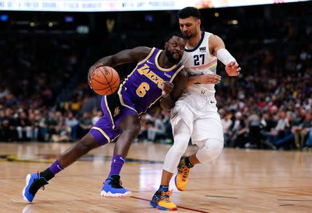 Nov 27, 2018; Denver, CO, USA; Denver Nuggets guard Jamal Murray (27) guards Los Angeles Lakers guard Lance Stephenson (6) in the third quarter at the Pepsi Center. Mandatory Credit: Isaiah J. Downing-USA TODAY Sports