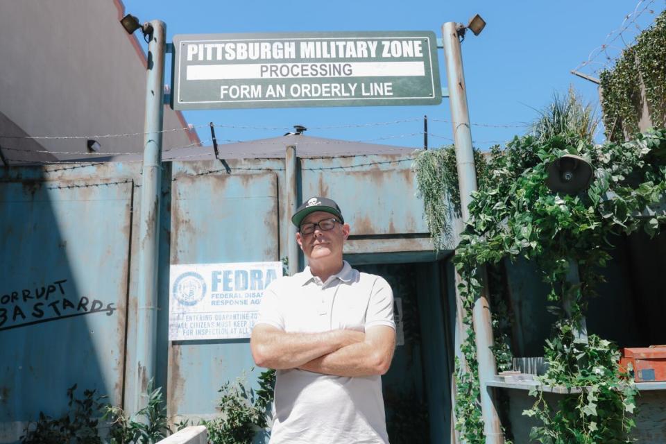 Maze designer John Murdy at the entrance to a haunted attraction themed to "The Last of Us" at Universal Studios Hollywood.