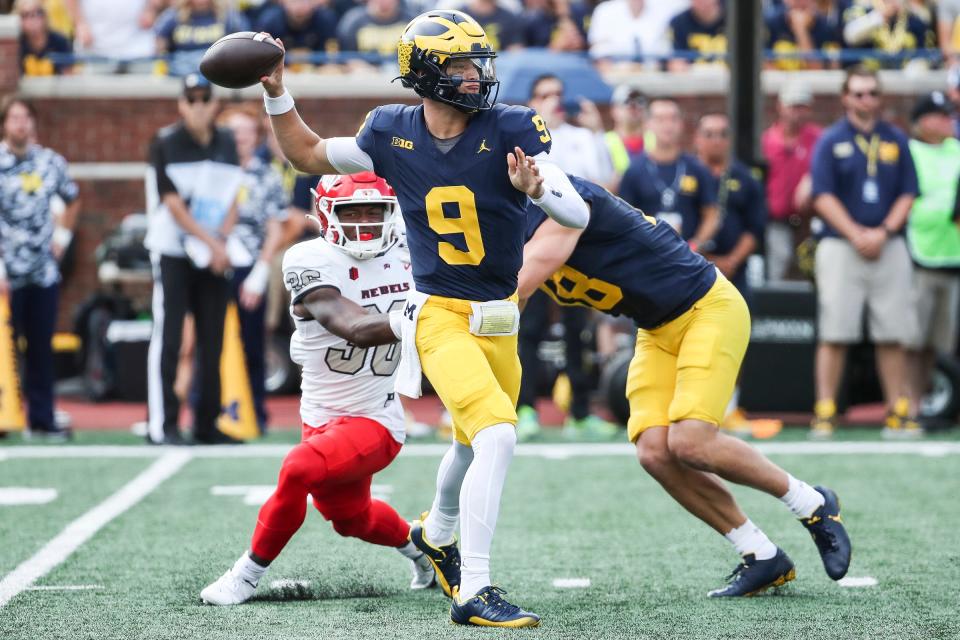 Michigan quarterback J.J. McCarthy (9) makes a pass against UNLV during the first half at Michigan Stadium in Ann Arbor on Saturday, Sept. 9, 2023.