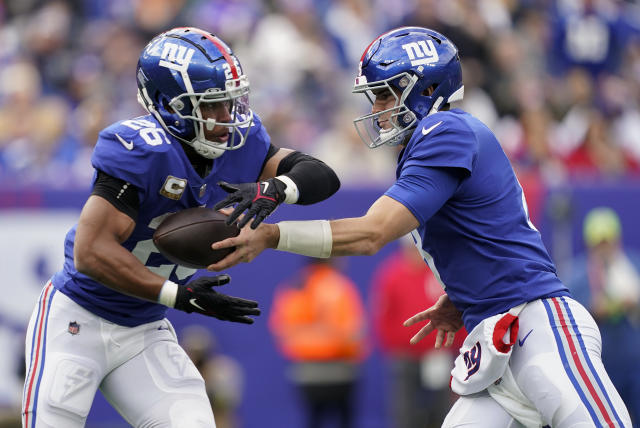 New York, USA. August 8, 2019, East Rutherford, New Jersey, USA: New York  Giants quarterback Daniel Jones (8) celebrates with running back Saquon  Barkley (26) after throwing his first touchdown pass during