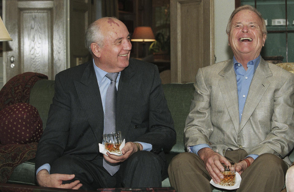 FILE - Los Angeles Mayor Richard Riordan, right, laughs heartily as he reacts to comment by former Soviet Leader Mikhail Gorbachev during a courtesy visit to the Mayor's official residence, Saturday, Oct. 18, 1997 in Los Angeles. Riordan, the moderate Republican multimillionaire who won two terms as mayor in Democrat-friendly Los Angeles and ran unsuccessfully for governor, died Wednesday, April 19, 2023. He was 92. (AP Photo/Damian Dovarganes, File)