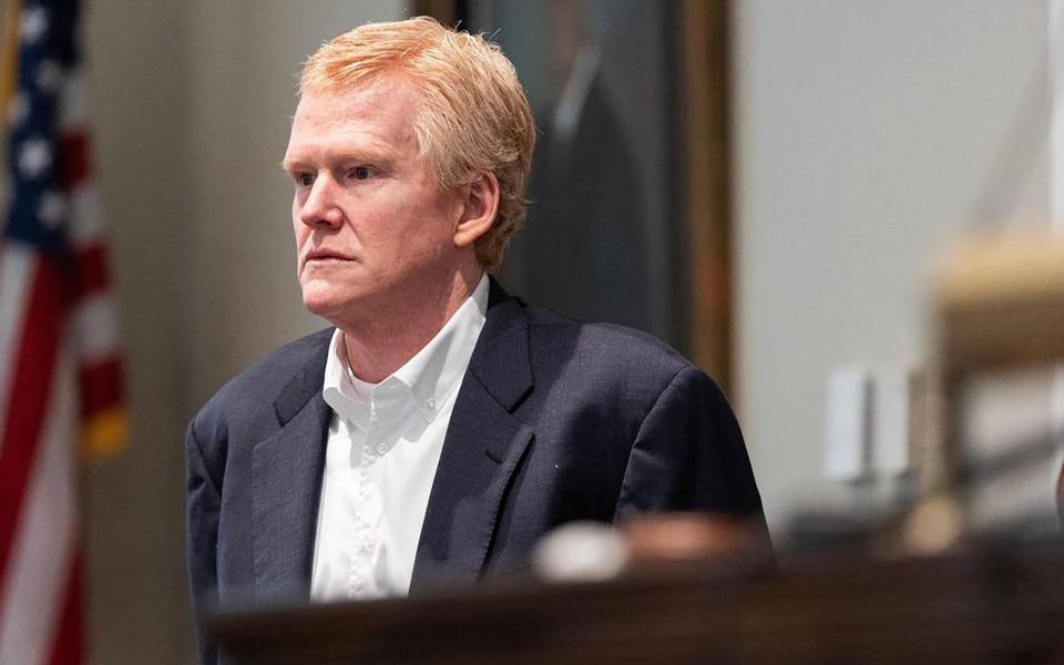 Alex Murdaugh stands next to the witness booth during a break in his trial for murder at the Colleton County