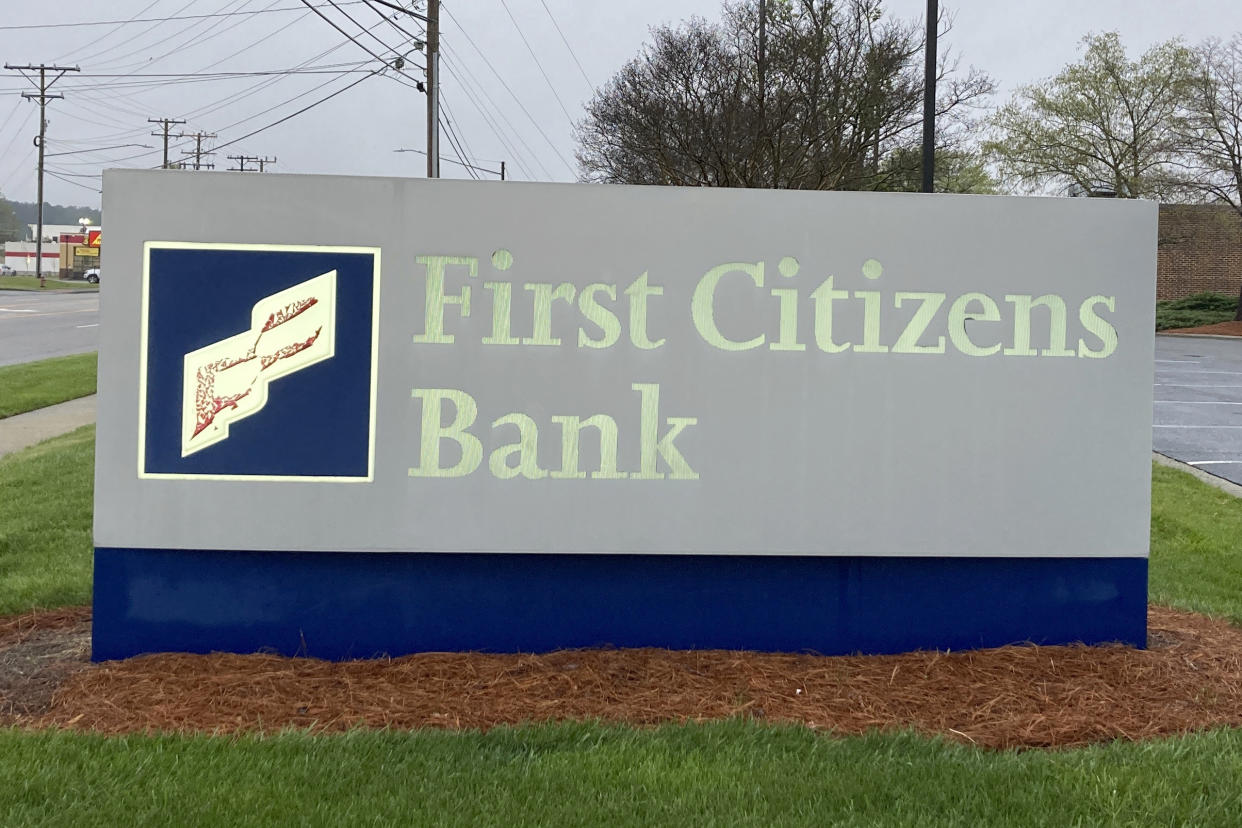 A First Citizens Bank sign is seen in Durham, North Carolina, on Monday, March 27, 2023. North Carolina-based First Citizens will buy Silicon Valley Bank, the tech industry-focused financial institution that collapsed earlier this month. (AP Photo/Jonathan Drew)