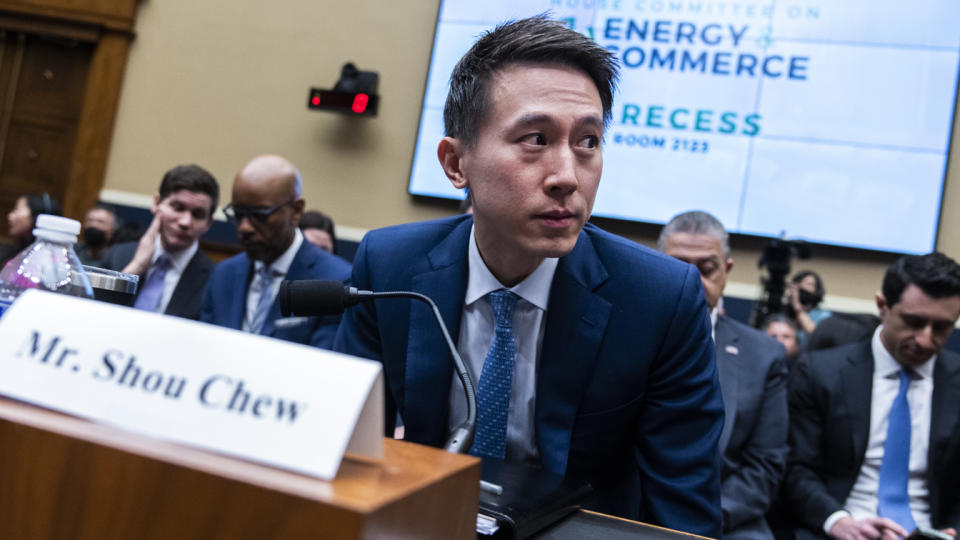 TikTok CEO Shou Zi Chew prepares to testify during the House Energy and Commerce Committee hearing titled 