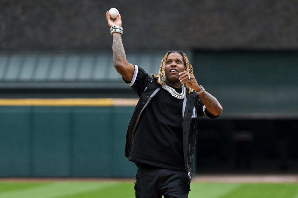 Lil Durk, throws a ceremonial first pitch before the game between the Chicago White Sox and the Los Angeles Angels at Guaranteed Rate Field on May 2, 2022 in Chicago. - Credit: Quinn Harris/Getty Images