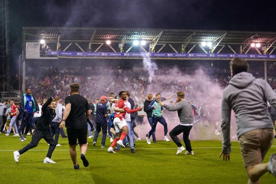 Fans swarm the pitch after Nottingham Forest beat Sheffield United (PA)