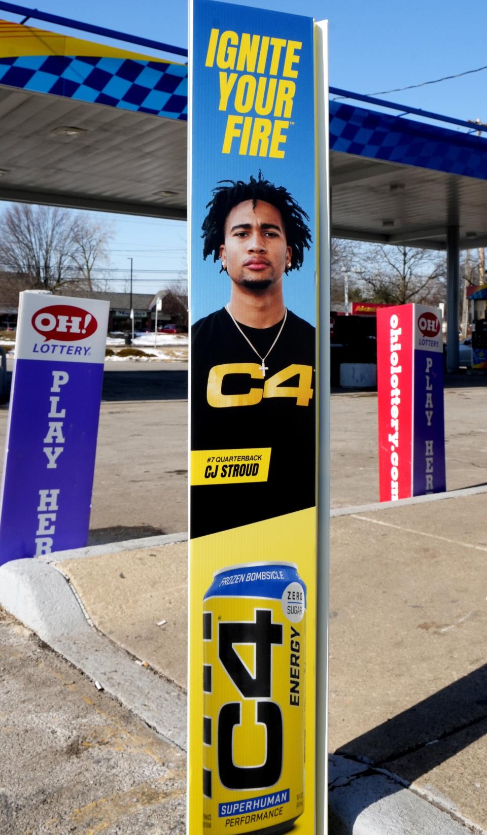 Ohio State quarterback C.J. Stroud appears on a C4 Energy drink advertisement at a Sunoco gas station located at 5800 Cleveland Ave.