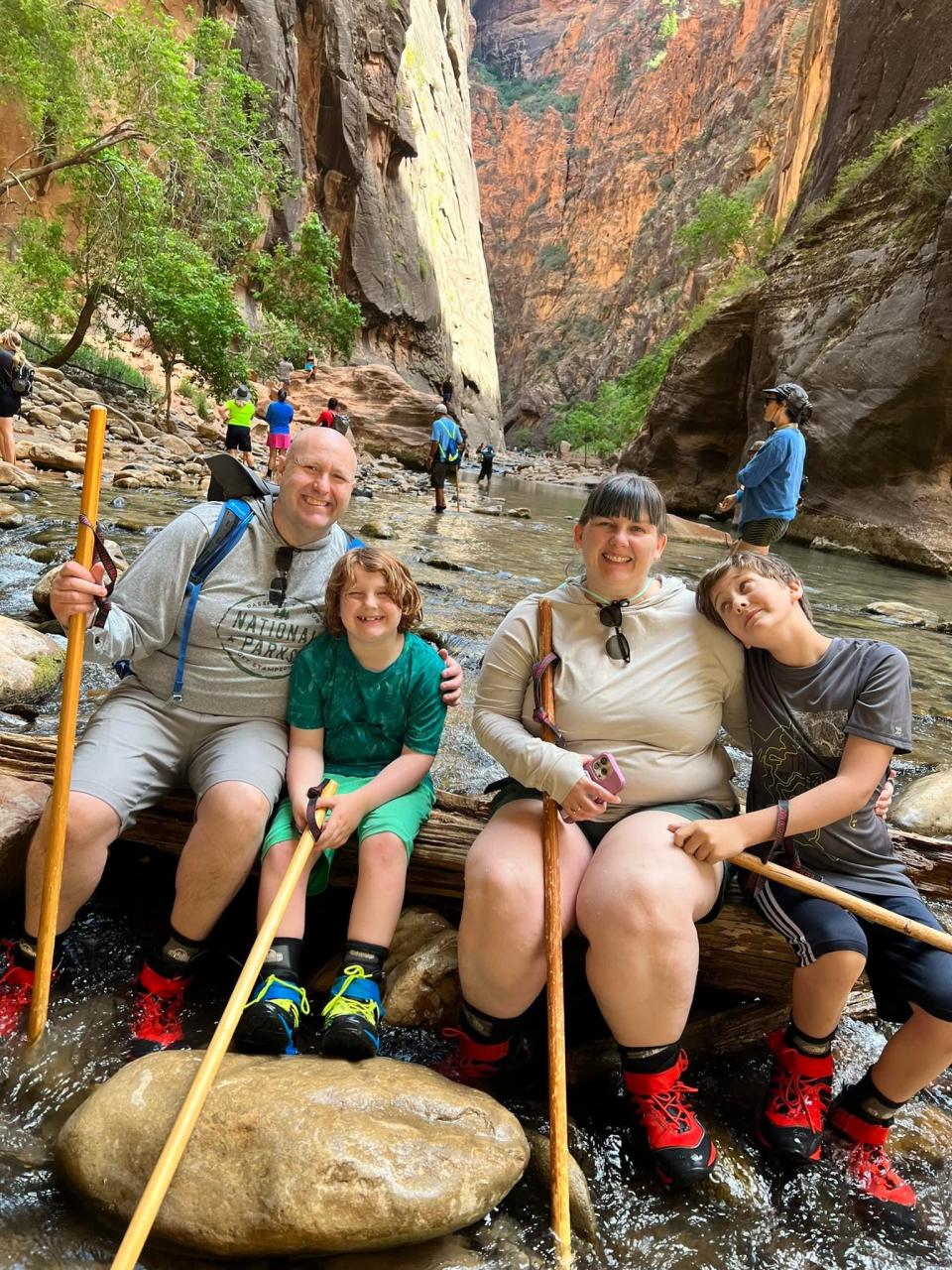 Scott and Jenn McCarty of Monroe and sons, Brian, 10, and Harrison, 8, hiked The Narrows in Zion National Park in Utah this summer. The family used The America the Beautiful National Park Pass to travel.