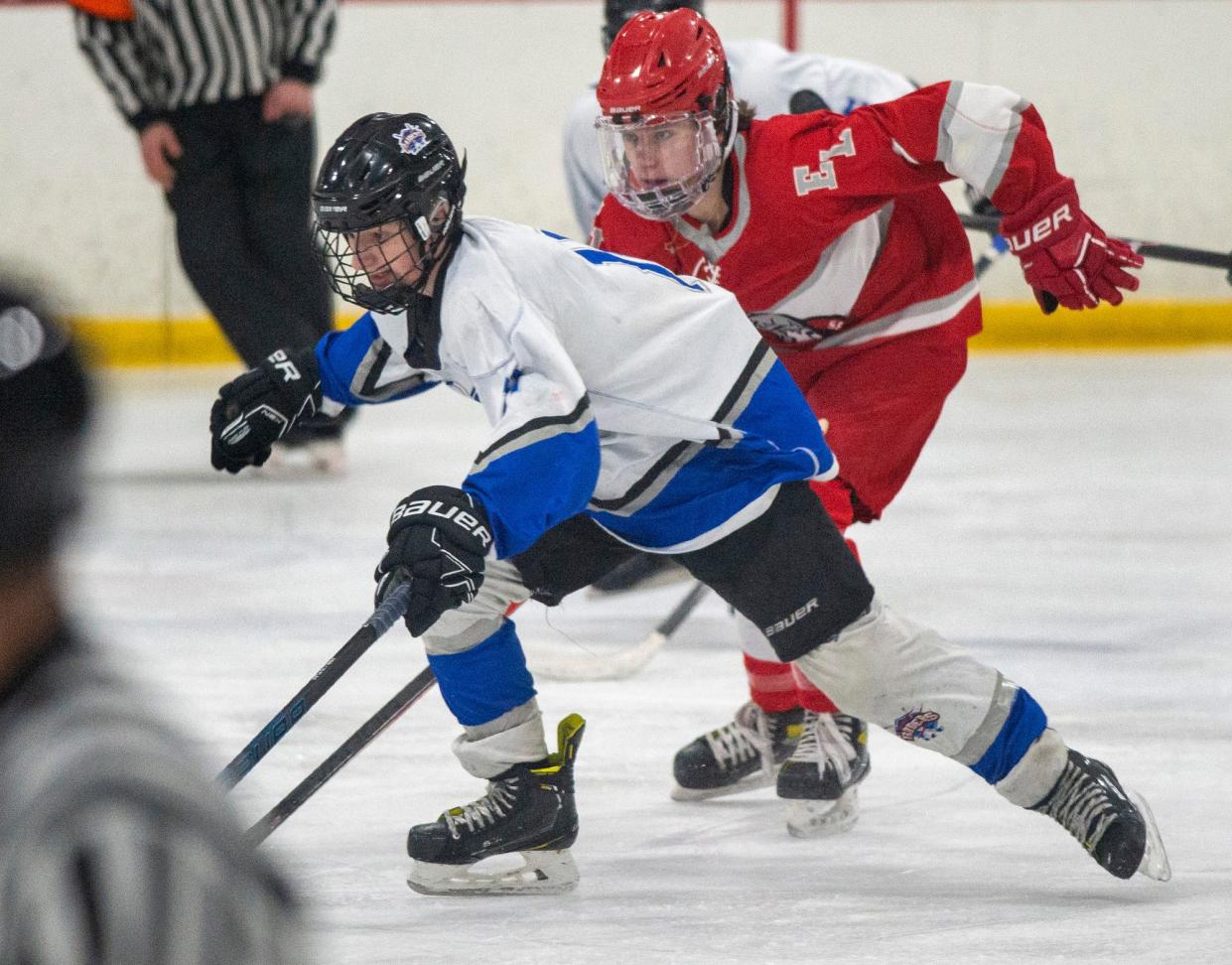 Hopedale/Milford hockey sophomore Aiden Collins skates against East Longmeadow in the MIAA Div. 3 Round of 32 at Blackstone Valley Iceplex, March 2, 2023. 