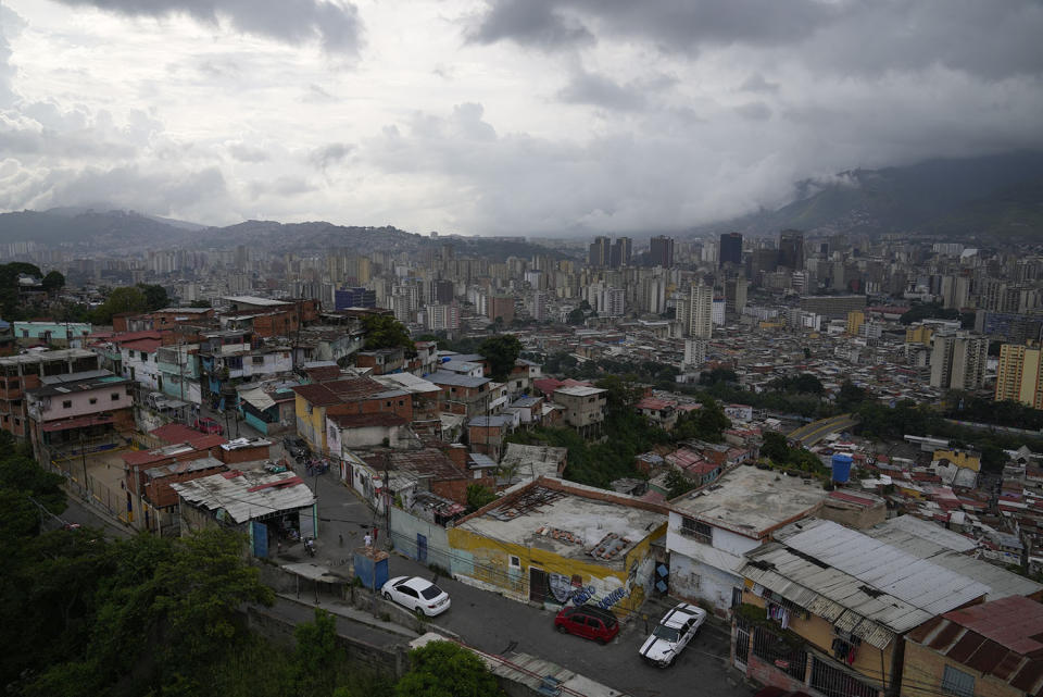 FILE - A view of the San Agustin neighborhood, during a tour organized by Cumbe Tour in Caracas, Venezuela Aug. 21, 2021. Over the last 10 years, more than 7.1 million people have left Venezuela amid a political, economic and humanitarian crisis that has marked the entirety of President Nicolas Maduro’s government. (AP Photo/Ariana Cubillos, File)