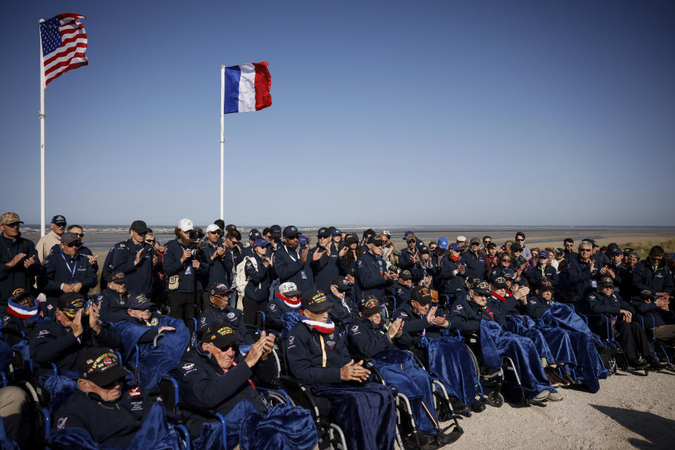 U.S. veterans attend the commemoration organized by the Best Defense Foundation at Utah Beach near Sainte-Marie-du-Mont, Normandy, France, Sunday, June 4, 2023, ahead of the D-Day Anniversary. The landings on the coast of Normandy 79 year ago by U.S. and British troops took place on June 6, 1944. (AP Photo/Thomas Padilla)