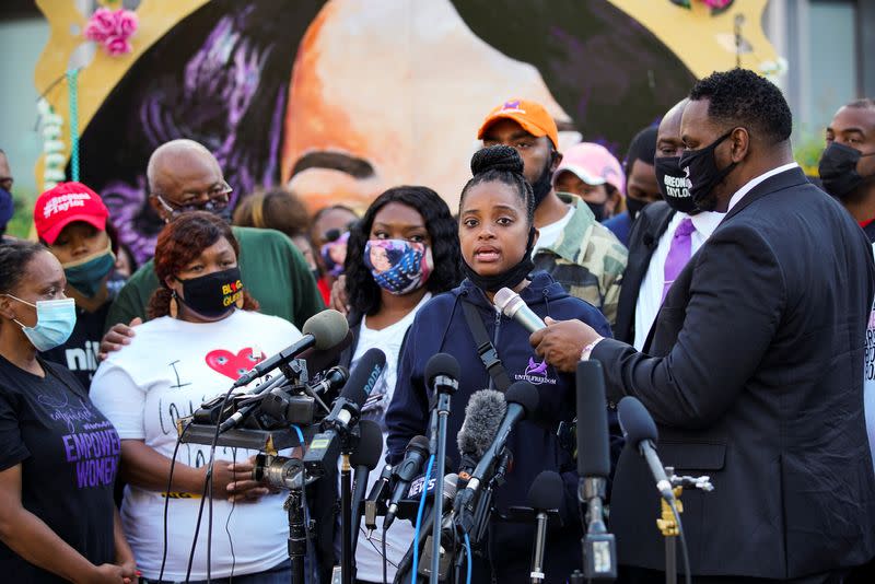 People react after a decision in the criminal case against police officers involved in the death of Breonna Taylor, in Louisville