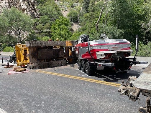 A mini bulldozer broke free from tow truck during a right curve State Route 39 in Ogden Canyon, Utah on July 6, 2024 killing a 57-year-old father and his 16-year-old daughter.