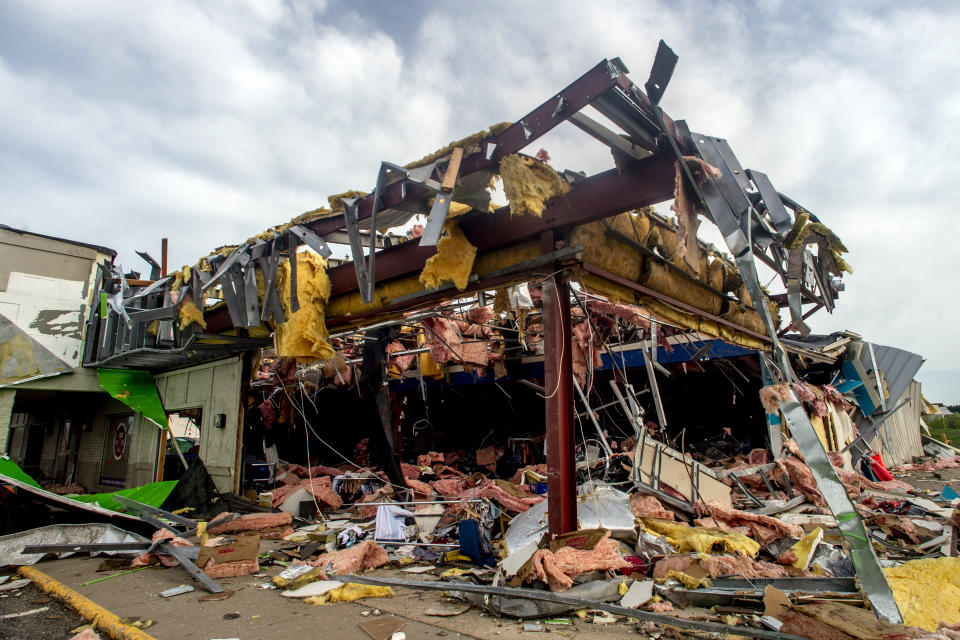 The remains of the Goodwill building is seen, Saturday, May 21, 2022, after a tornado came through the area by Michigan state Highway 32 the day before, in Gaylord, Mich. (Jake May/MLive.com/The Flint Journal via AP)