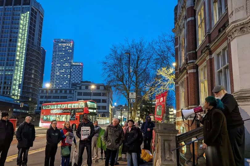 Protestors gathered outside Croydon town hall last night in opposition to the council tax rises and service cuts