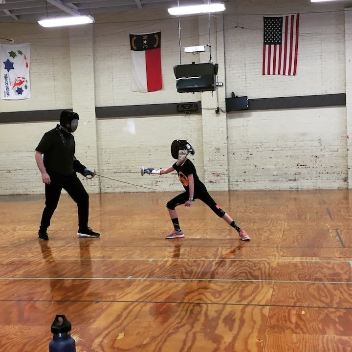 "My 11-year-old daughter fencing with her coach. She is strong, fierce and competes in a sport dominated by boys. I am so amazed by her."