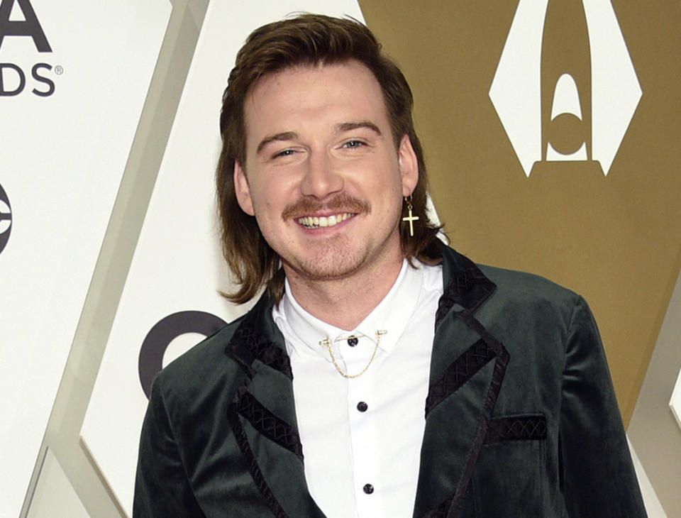 FILE - Morgan Wallen arrives at the 53rd annual CMA Awards on Nov. 13, 2019, in Nashville, Tenn. Despite that his album, “Dangerous: The Double Album,” was one of the biggest selling albums of the year, spending 10 weeks on top of Billboard 200 albums chart, Wallen received no Grammy nominations. (Photo by Evan Agostini/Invision/AP, File)