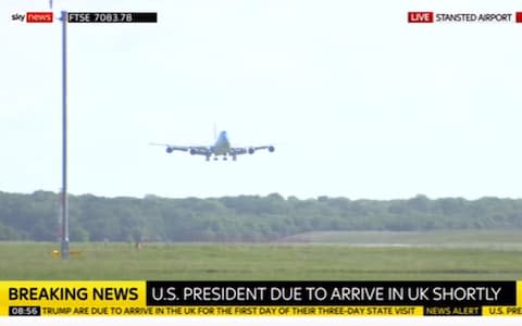 Air Force One pictured on a live stream, showing that the tweets were sent from the air - Credit: Sky News