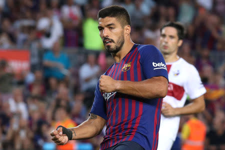 Soccer Football - La Liga Santander - FC Barcelona v SD Huesca - Camp Nou, Barcelona, Spain - September 2, 2018 Barcelona's Luis Suarez celebrates scoring their eighth goal REUTERS/Albert Gea