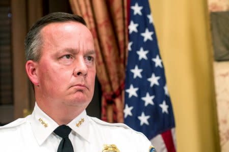 FILE PHOTO:  Police Commissioner Kevin Davis looks on during a news conference in Baltimore, Maryland, U.S.  July 8, 2015.  REUTERS/Bryan Woolston/File Photo