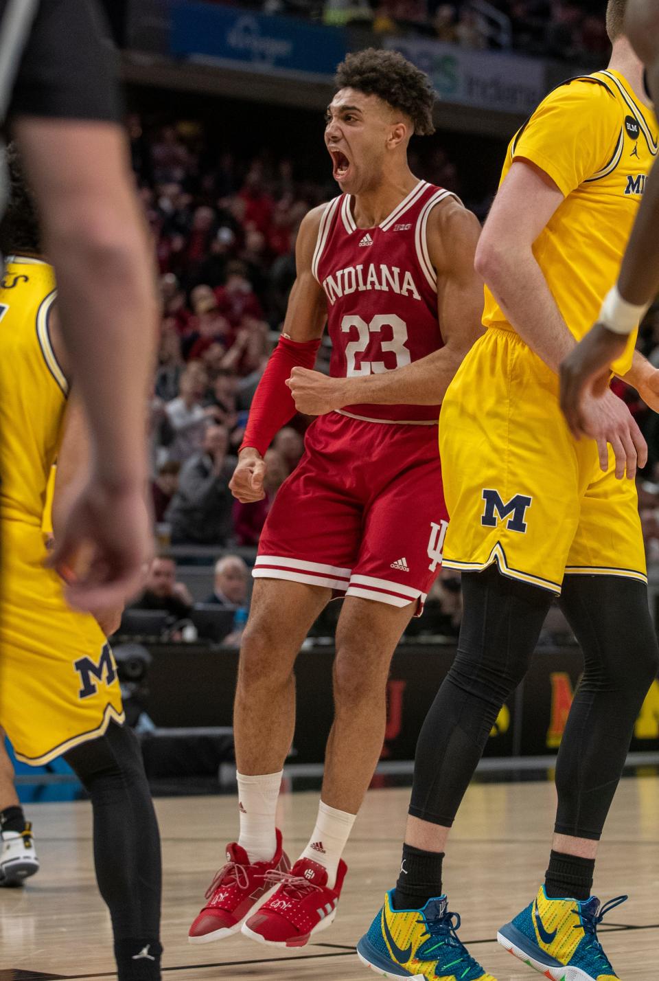 Indiana Hoosiers forward Trayce Jackson-Davis (23) celebrates a big play against Michigan, Thursday, March 10, 2022, during Big Ten tournament men’s action from Indianapolis’ Gainbridge Fieldhouse. Indiana won 74-69. 